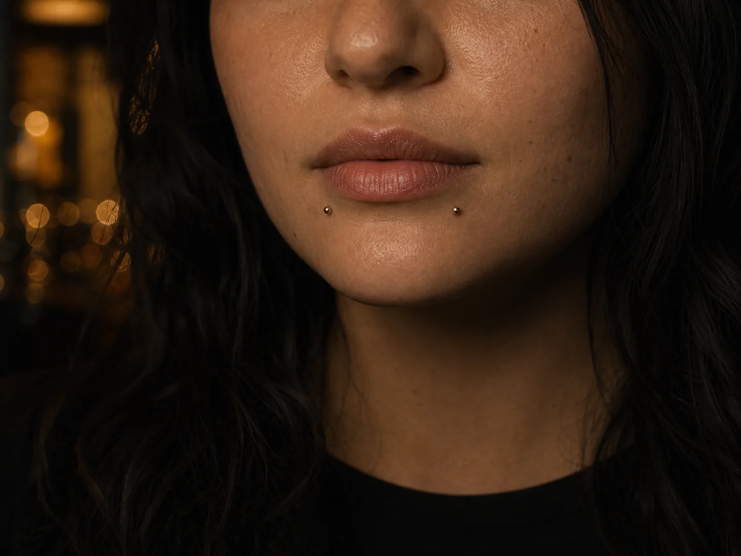 Paired warm detail — original facial piercing jewelry direction photographed for Chill Ink