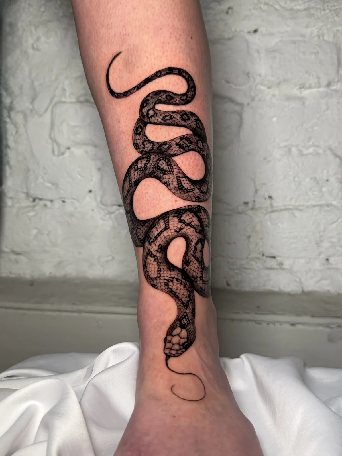 Custom black ink tattoo designed at Chill Ink Tattoo Galata